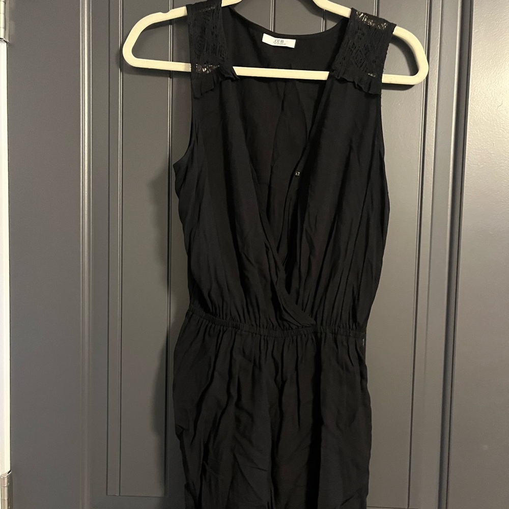 Sleeveless Black V-Neck Romper with Lace Trim